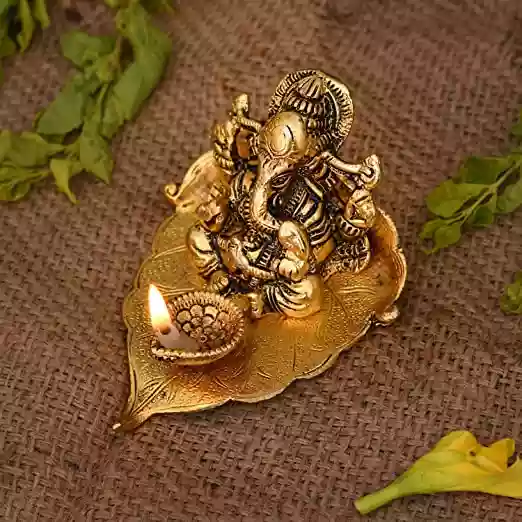 Collectible India Ganesh Idol on Leaf - Lord Ganesha with Diya - Metal Hand Craved for Home Decorative Gift Puja Gifts Corporate